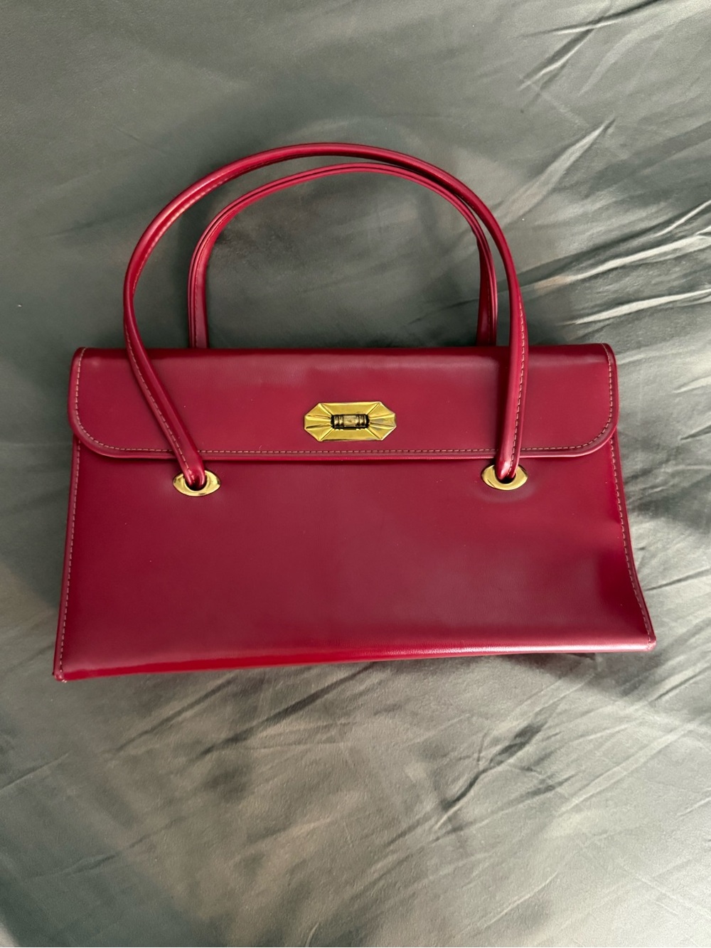 Structured Dark Red Leather Shoulder Bag with Gold Hardware. Vintage.